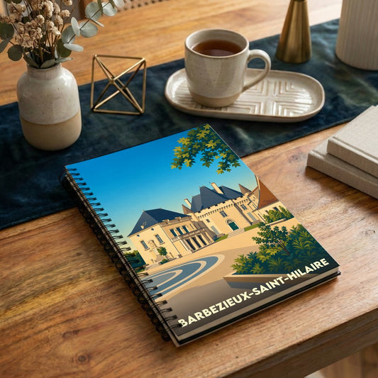 Carnet de notes à spirales souvenir de la ville de Barbezieux-Saint-Hilaire avec une illustration stylisée de son château.