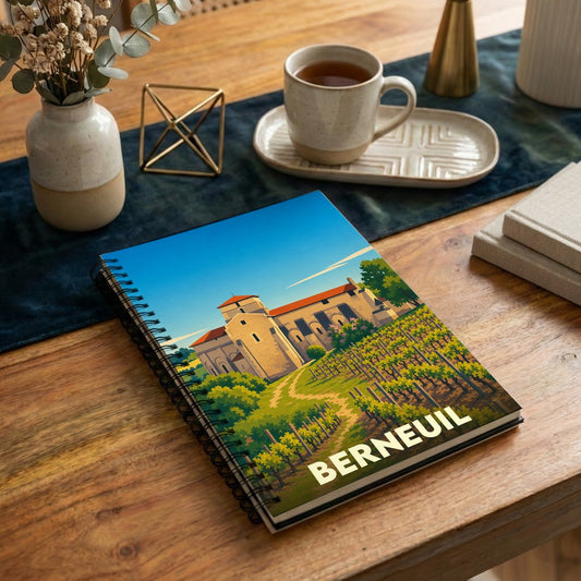 Carnet souvenir de la ville de Berneuil avec une illustration stylisée de son église et de ses vignobles.