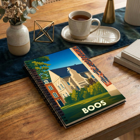 Carnet souvenir de la ville de Boos avec une illustration stylisée d'un bâtiment historique.