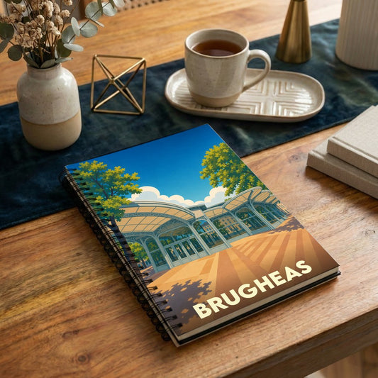 Carnet souvenir de la ville de Brugheas avec une illustration stylisée.