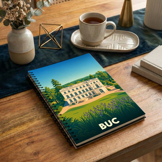 Carnet à spirales souvenir de la ville de Buc avec une illustration stylisée de son château.