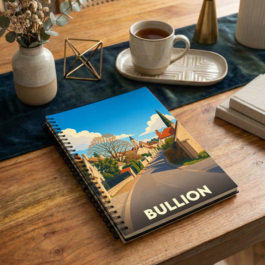 Carnet à spirales souvenir de la ville de Bullion avec une illustration stylisée d'un paysage urbain.