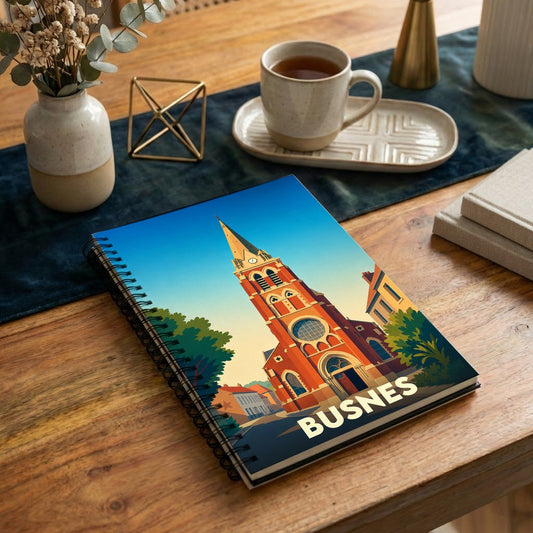 Carnet de notes souvenir de la ville de Busnes orné d'une illustration stylisée de son église.