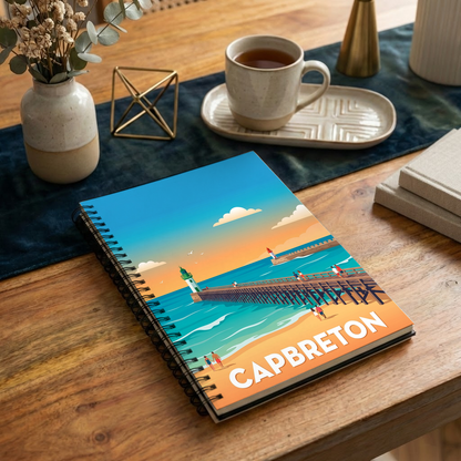 Carnet souvenir de la ville de Capbreton avec une illustration stylisée de son bord de mer.