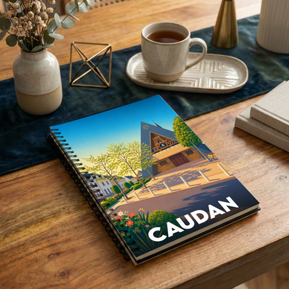 Carnet souvenir de la ville de Caudan avec une illustration stylisée de son église et de sa place.