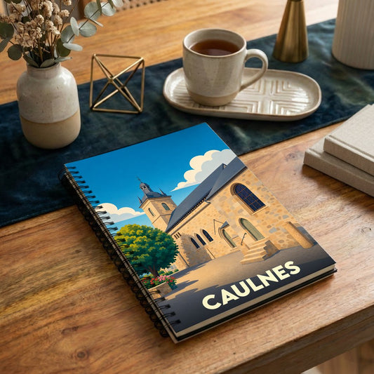 Carnet souvenir de la ville de Caulnes avec une illustration stylisée d'une église sous un ciel bleu.
