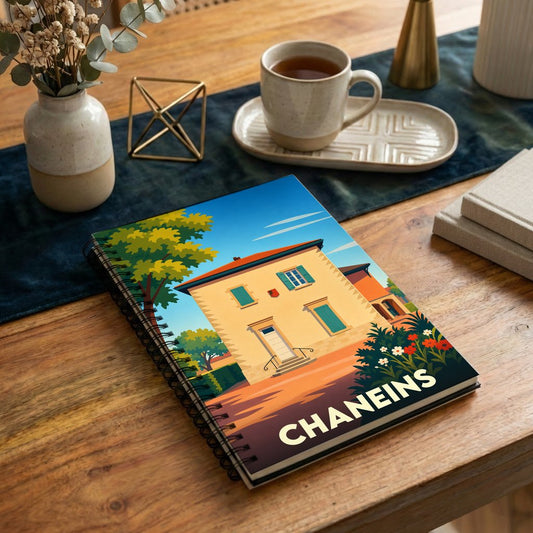 Carnet à spirale souvenir de la ville de Chaneins avec une illustration stylisée.