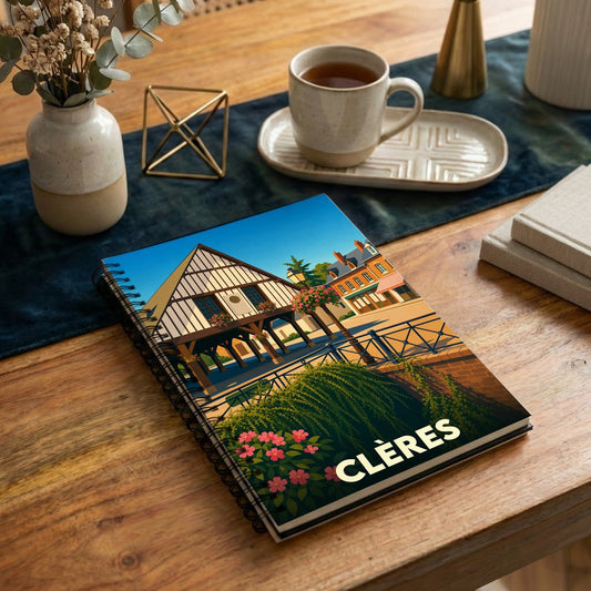 Carnet souvenir de la ville de Clères avec une illustration stylisée et colorée.