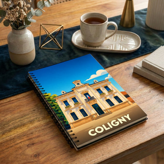 Carnet souvenir de la ville de Coligny avec une illustration stylisée de son hôtel de ville.