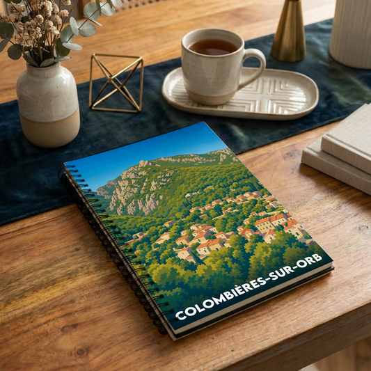 Carnet souvenir de la ville de Colombières-sur-Orb avec une illustration stylisée.