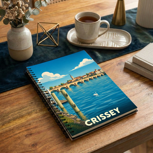 Carnet souvenir de la ville de Crissey avec une illustration stylisée d'un paysage fluvial.