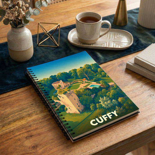 Carnet à spirales souvenir de la ville de Cuffy avec une illustration stylisée de son château.