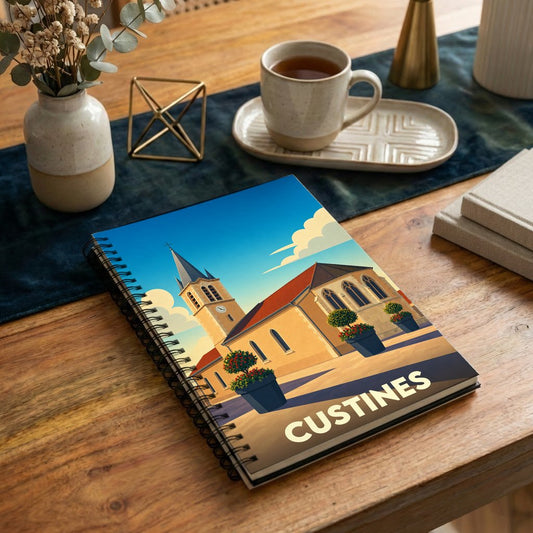 Carnet souvenir de la ville de Custines avec une illustration stylisée de son église.