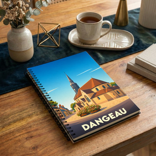 Carnet souvenir de la ville de Dangeau avec une illustration stylisée de son église.