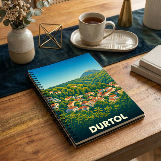 Carnet souvenir de la ville de Durtol avec une illustration stylisée d'un paysage vallonné.