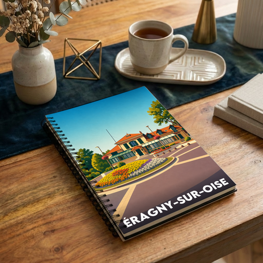 Carnet souvenir de la ville d'Éragny-sur-Oise avec une illustration stylisée.