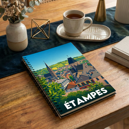 Carnet à spirales souvenir de la ville d'Étampes avec une illustration stylisée.