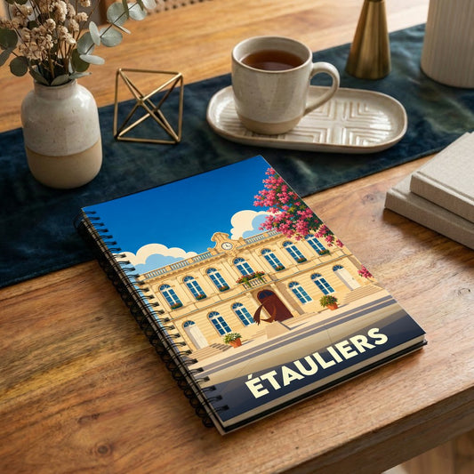 Carnet souvenir de la ville d'Étauliers illustré d'un dessin stylisé de sa mairie.