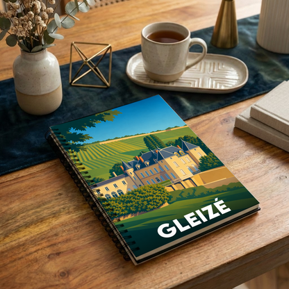 Carnet à spirales souvenir de la ville de Gleizé avec une illustration stylisée d'un château entouré de vignes.