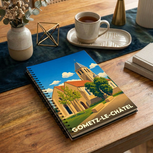 Carnet de notes à spirales souvenir de la ville de Gometz-le-Châtel avec une illustration stylisée de son église.