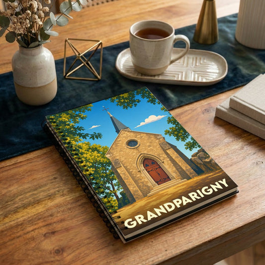 Carnet souvenir de la ville de Grandparigny avec une illustration stylisée d'une église en pierre.