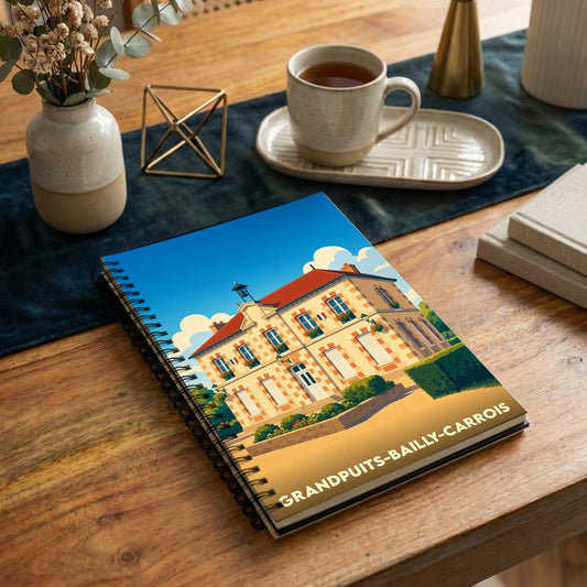 Carnet souvenir de la ville de Grandpuits-Bailly-Carrois avec une illustration stylisée de sa mairie.