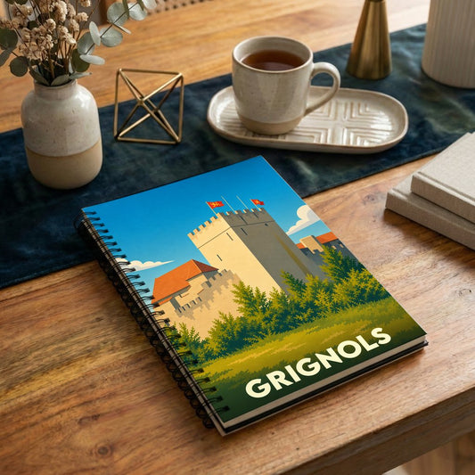 Carnet à spirales souvenir de la ville de Grignols avec une illustration stylisée de son château.