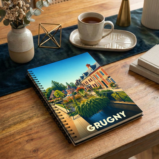 Carnet à spirale souvenir de la ville de Grugny avec une illustration stylisée et colorée.