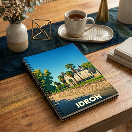 Carnet souvenir de la ville d'Idron avec une illustration stylisée.