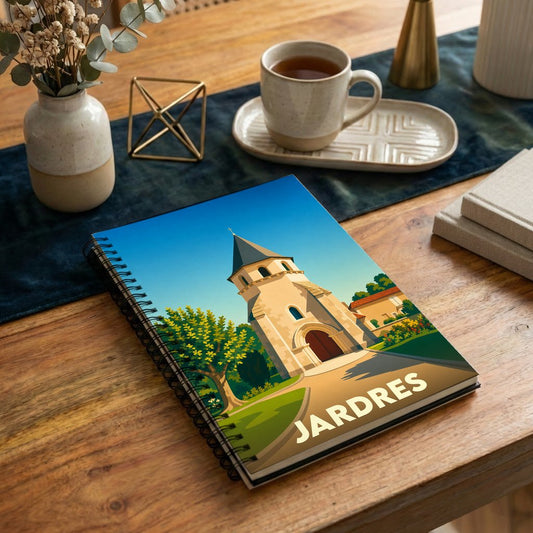 Carnet à spirale souvenir de la ville de Jardres avec une illustration stylisée de son église.
