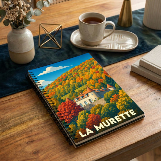 Carnet à spirales souvenir de la ville de La Murette avec une illustration stylisée d'un château en automne.