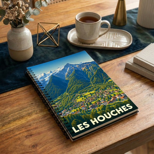 Carnet de notes souvenir de la ville de Les Houches illustré d'un paysage de montagne stylisé.