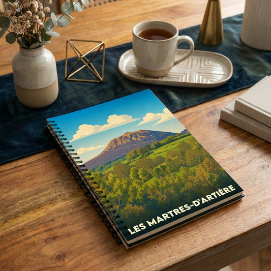 Carnet souvenir de la ville de Les Martres-d'Artière avec une illustration stylisée du Puy de Dôme.