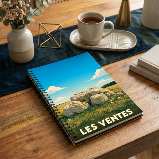 Carnet souvenir de la ville de Les Ventes avec une illustration stylisée d'un monument mégalithique.