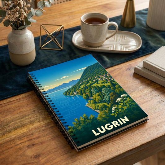 Carnet de notes à spirales souvenir de la ville de Lugrin avec une illustration paysagère stylisée.