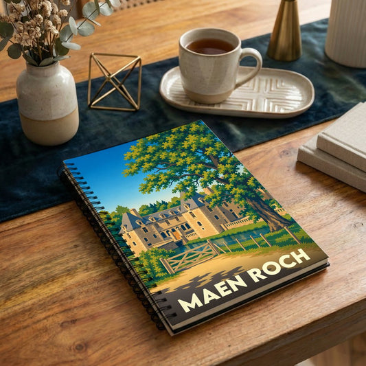 Carnet de notes souvenir de la ville de Maen Roch avec une illustration stylisée de son château.