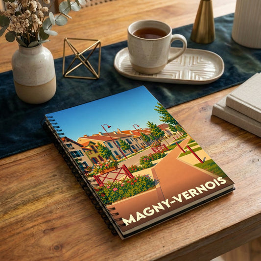 Carnet à spirales souvenir de la ville de Magny-Vernois avec une illustration stylisée.
