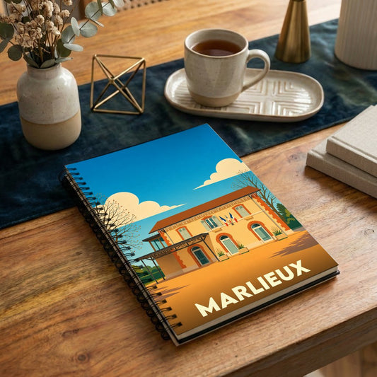 Carnet souvenir de la ville de Marlieux avec une illustration stylisée d'un bâtiment emblématique.