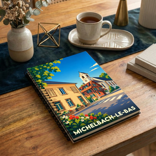Carnet souvenir de la ville de Michelbach-le-Bas avec une illustration colorée et stylisée de ses bâtiments typiques.