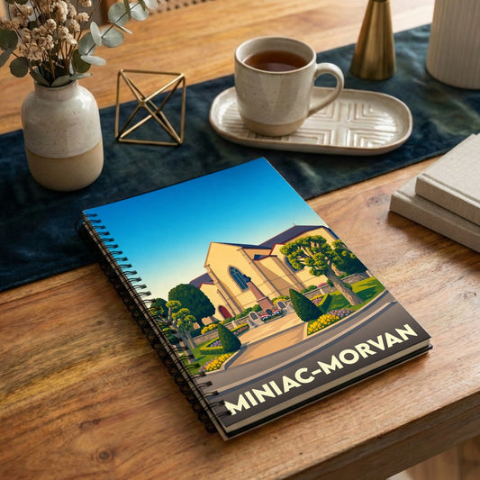 Carnet de notes souvenir de la ville de Miniac-Morvan avec une illustration stylisée.