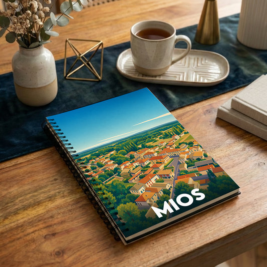 Carnet souvenir de la ville de Mios avec une illustration stylisée vue du ciel.