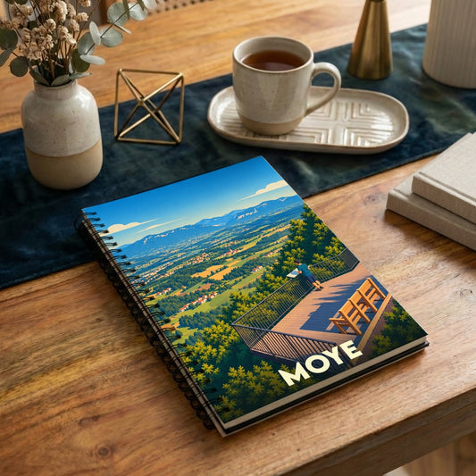 Carnet souvenir de la ville de Moye avec une illustration stylisée d'un panorama de montagne.