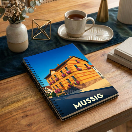 Carnet souvenir de la ville de Mussig avec une illustration stylisée d'un bâtiment traditionnel alsacien.