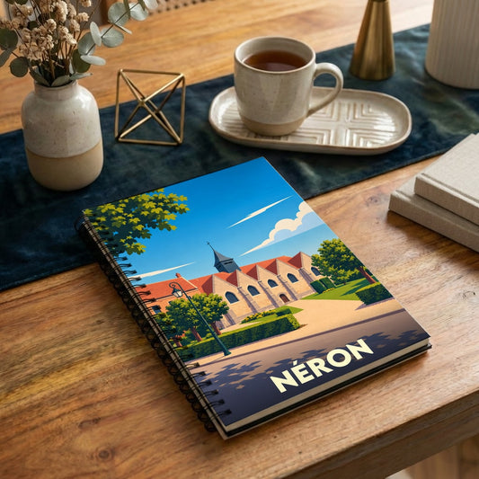 Carnet de notes souvenir de la ville de Néron illustré d'un paysage urbain stylisé.