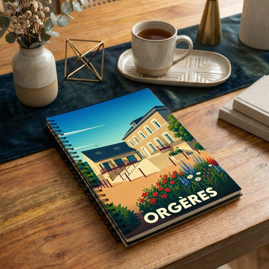 Carnet souvenir de la ville d'Orgères avec une illustration stylisée et colorée de son architecture.