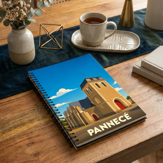 Carnet souvenir de la ville de Pannecé avec une illustration stylisée de son église sur la couverture.