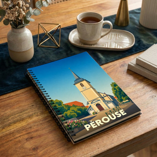 Carnet souvenir de la ville de Pérouse avec une illustration stylisée de son église sous un ciel bleu.