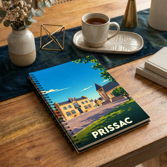 Carnet à spirales souvenir de la ville de Prissac avec une illustration stylisée.
