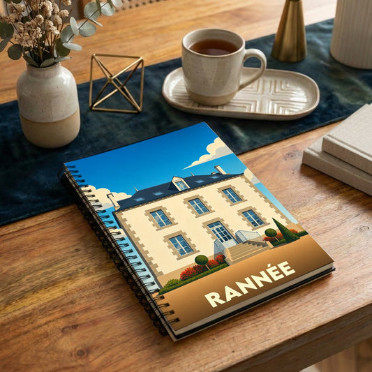 Carnet à spirale souvenir de la ville de Rannée avec une illustration stylisée.