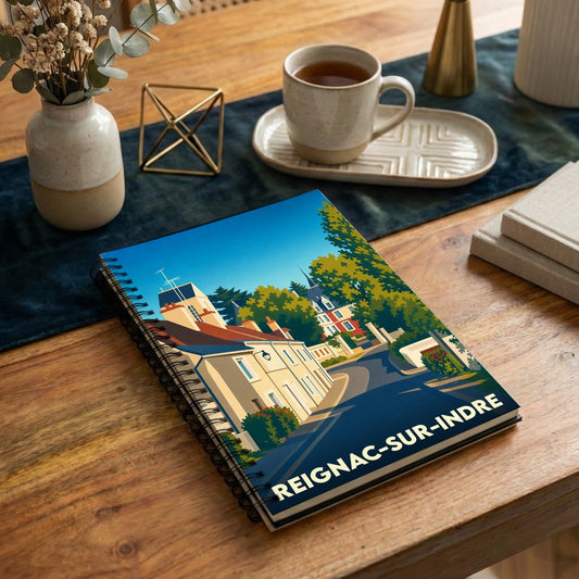 Carnet souvenir de la ville de Reignac-sur-Indre avec une illustration stylisée.